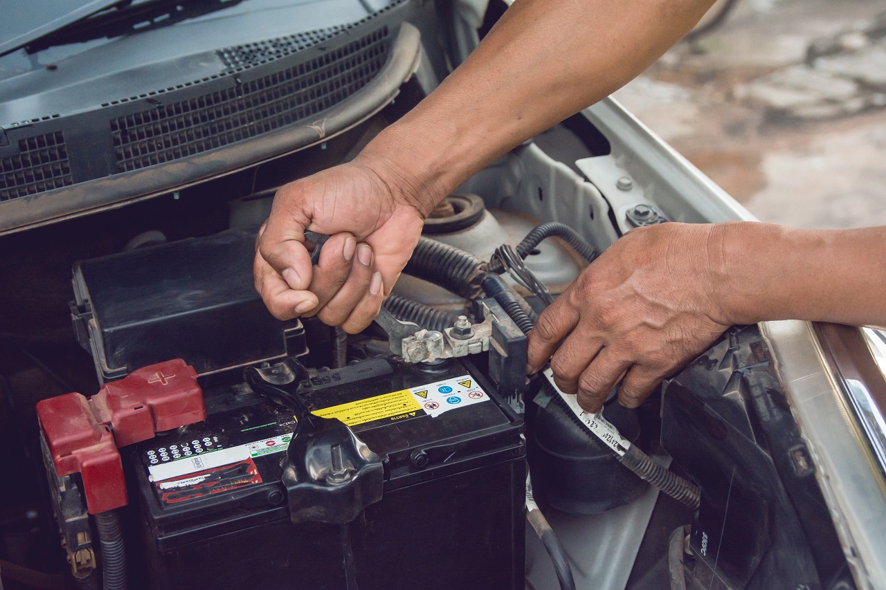 Timber Towing Field Service Tech Installing Battery For Our Car Jump Start Service